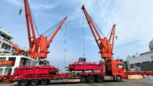 Image of two Jinghai USVs setting out for Antarctic expedition in 2023: Shanghai University Research Institute of USV Engineering.
